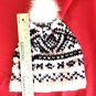 Hand knit Nordic design hat with removable Pompom