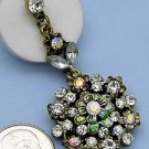 Goldtone White Crystal Drop Dangle Earrings Flower Theme Green & Gold Metal Cast Goldtone White Crystal Drop Dangle Earrings Flower Theme Green & Gold Metal Cast
