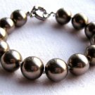 12mm Mother of Pearl Bead Bracelet Bronze Silvertone Clasp 7.5" Long