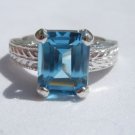 4.15 Carat Medium Blue Topaz Ring Sterling Silver .925 Emeral Cut Engraved Shank 4.15 Carat Medium Blue Topaz Ring Sterling Silver .925 Emeral Cut Engraved Shank