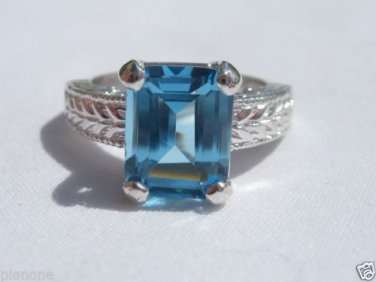 4.15 Carat Medium Blue Topaz Ring Sterling Silver .925 Emeral Cut Engraved Shank
