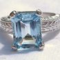 4.23 Carat Light Blue Topaz Ring Sterling Silver .925 Emeral Cut Engraved Shank