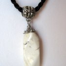 1.2" Long Variegated White Howlite Pendant on 16" Black Silk Cord Natural Look 1.2" Long Variegated White Howlite Pendant on 16" Black Silk Cord Natural Look