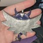 Key Pendant with Glitter Wings [0015]