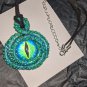 Green eyed Tentacle Cyclops Necklace  [0034]