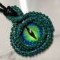 Green eyed Tentacle Cyclops Necklace  [0034]