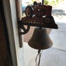 Farmhouse Dinner Bell with McCormick Deering Farmall Tractor Cutout in Cast Iron