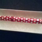 Shiny Red Pen with tiny white HEARTS