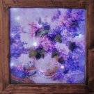 Gorgeous handmade diamond painting with custom made frame and backlighting.