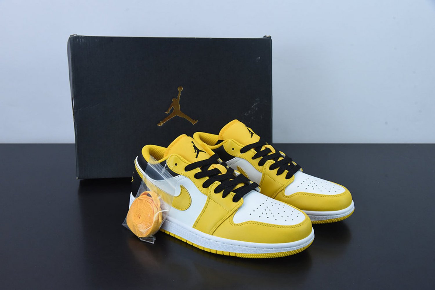 Jordan 1 Low University Gold