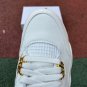 Nike Air Jordan 4 with Metallic Gold
