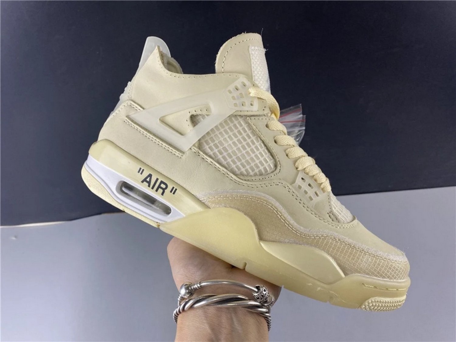 Off-white X Nike  Air Jordan 4 Retro Sail  muslin Sneaker