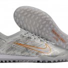 Mercurial Vapor 15 Elite Turf XXV SE Disruption - Metallic SilverWolf GreyBlack