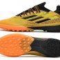 X Speedflow Messi.1 TF Mi Historia - GoldBlackYellow