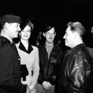 Clark Gable and Spencer Tracy Talk Helen O Hara, Unknown, and Bunny Waters look on, 1943 Photo