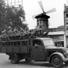 Occupying German Soldiers Pass the Moulin Rouge August 8, 1940 Photo