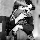 Jackie Coogan and Charlie Chaplin in The Kid Photo