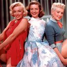 Marilyn Monroe, Lauren Bacall, and Betty Grable Photo