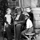 Luana Patten, James Baskett, Glenn Leedy, and Bobby Driscoll in Song of the South Photo