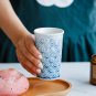 Handmade ceramic vintage teacup with blue and white underglaze color classical relief pattern