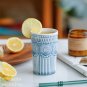 Handmade ceramic vintage teacup with blue and white underglaze color classical relief pattern
