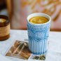 Handmade ceramic vintage teacup with blue and white underglaze color classical relief pattern
