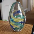 Clear Glass Egg Shaped Green Blue Yellow Swirls Paperweight  #181