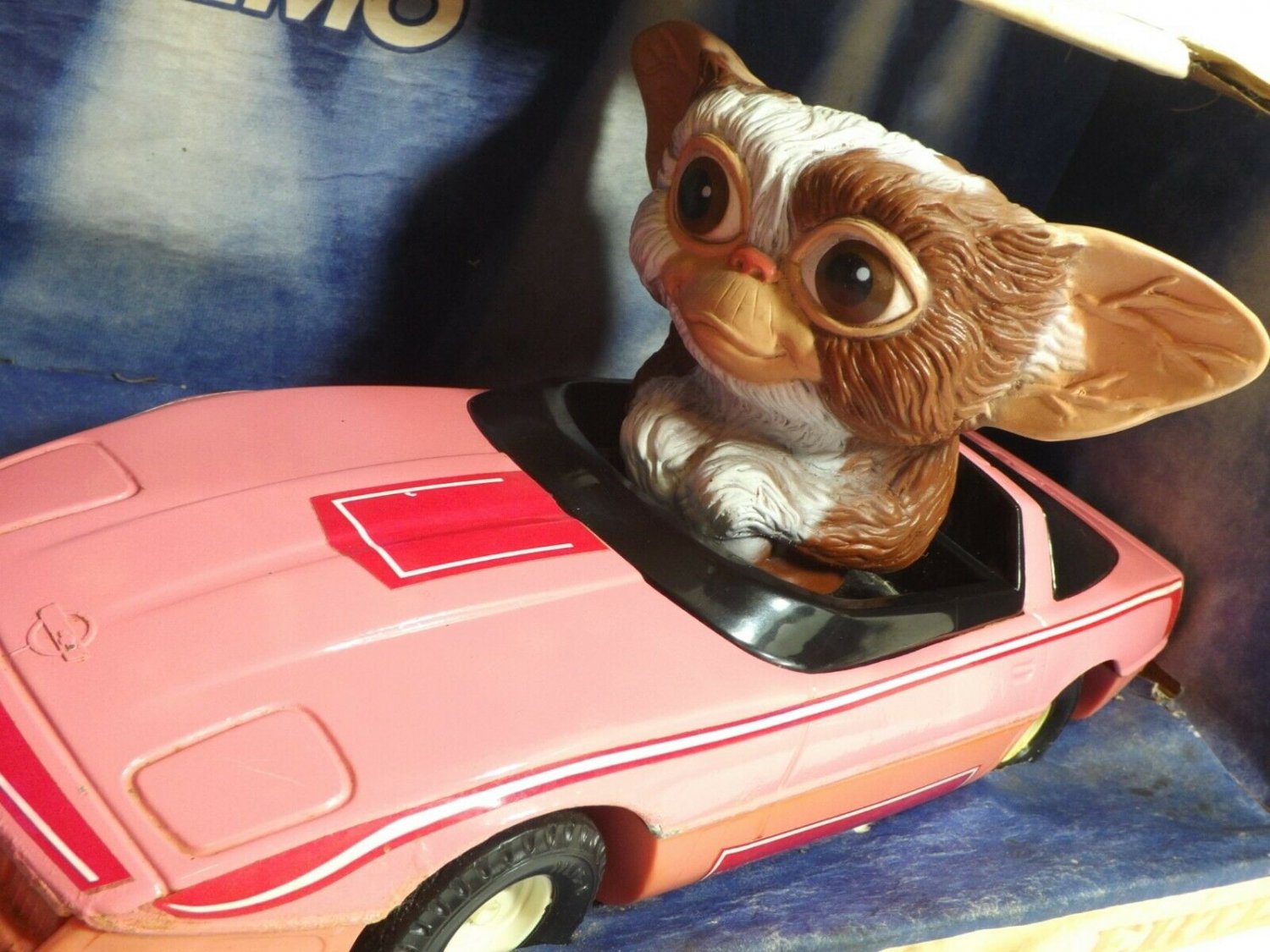 gizmo driving barbie car