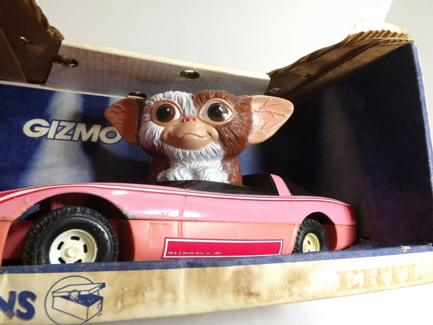 gizmo driving barbie car