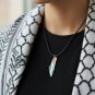 Reflections of Palestine: A Silver Framed Map necklace with Stainless Steel