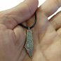 Roots of Palestine: A mini Map Necklace with the Heart of Its Cities on its back