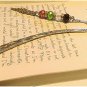 metallic bookmark adorned with Palestinian flag beading adds elegance to every p