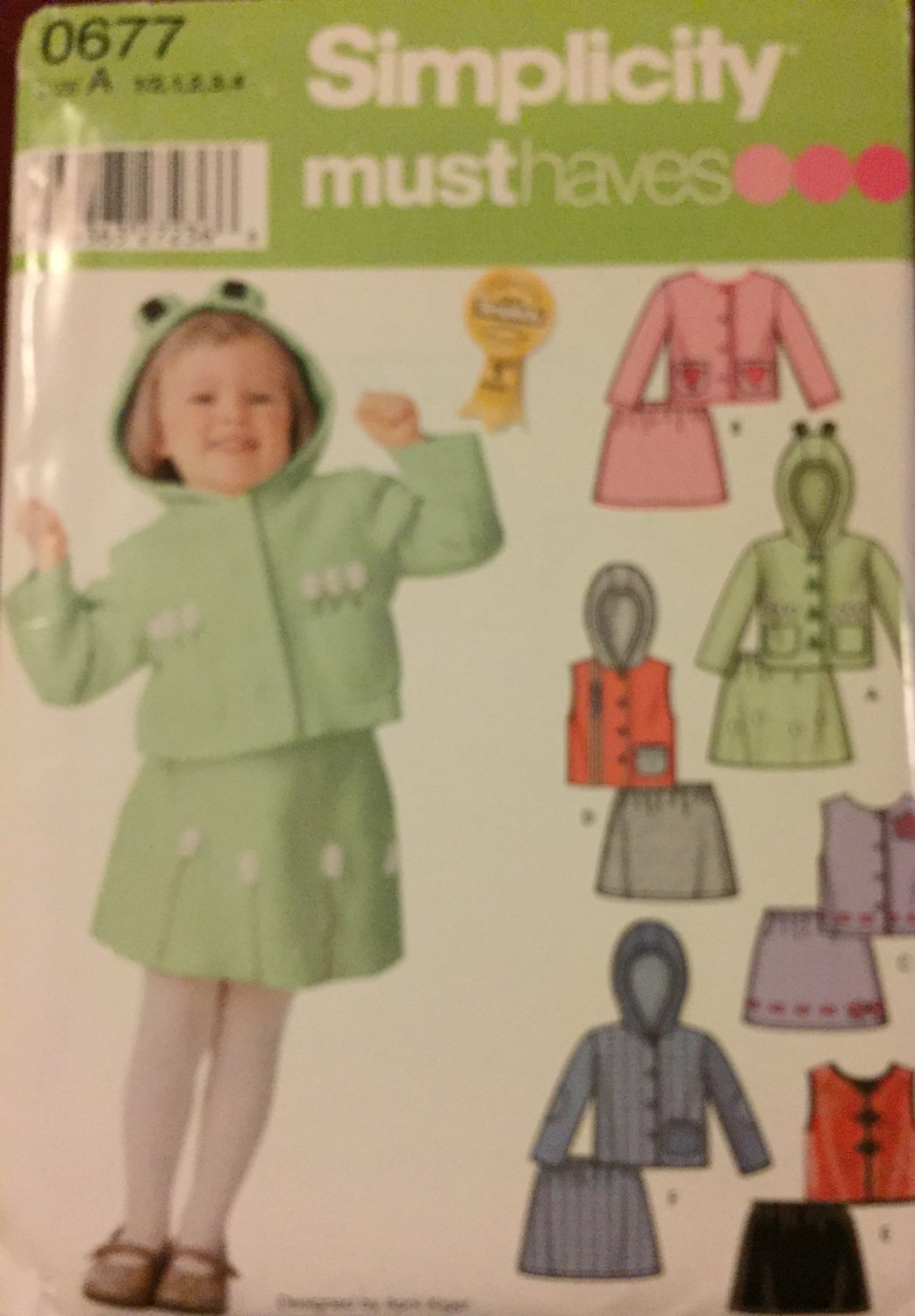 Simpliicity 0677 Must Have Sewing pattern Toddlers' Jacket or vest and skirt sizes 1/2, 1, 2, 3. 4