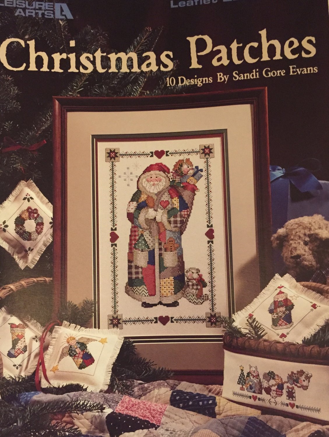 SOLD OUT Leisure Arts #2202 Christmas Patches Cross Stitch Pattern 10 Designs by Sandi Gore Evans.