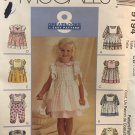 McCalls 9194 Toddlers' Dress Jumpsuit Pinafore and Pinny Sewing Pattern size 1 2 3