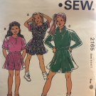 Kwik Sew 2165 Girls' Top & Skorts Sewing Pattern Size 4 to 7 designed for stretch knits