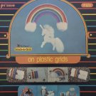 Rainbows on Plastic Grids Plastic Canvas pattern 6751 instructions for Unicorn Rainbow mobile