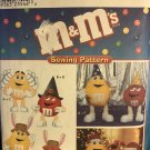 McCall's 8994 Sewing patterns for M & M Characters with hats for different occasions