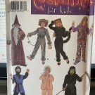 Simplicity 5411 Magician, Lion, Cat, Hippie, Ninja, Babydoll and Reaper costumes child size 3 - 8