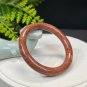 Fossilized Coral Bangle 53MM Porcelain Luster Jadeification Celestial Eye Phoenix Tail Round