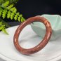 Fossilized Coral Bangle 53MM Porcelain Luster Jadeification Celestial Eye Phoenix Tail Round