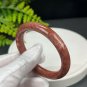 Fossilized Coral Bangle 53MM Porcelain Luster Jadeification Celestial Eye Phoenix Tail Round