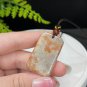Fossilized Coral Pendant Necklace Icy Jadeification Bryozoan Ice Gray Orange Rectangle