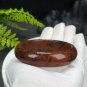 Mexican Golden Silk Red Obsidian Bangle 58MM Floating Black Freeform Patterns