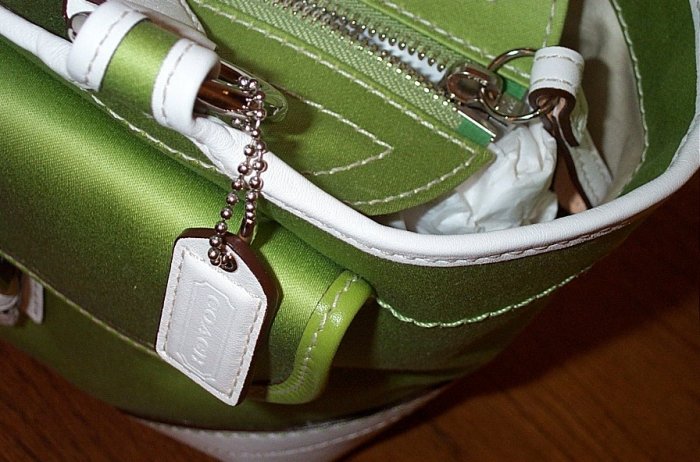 green and white coach purse