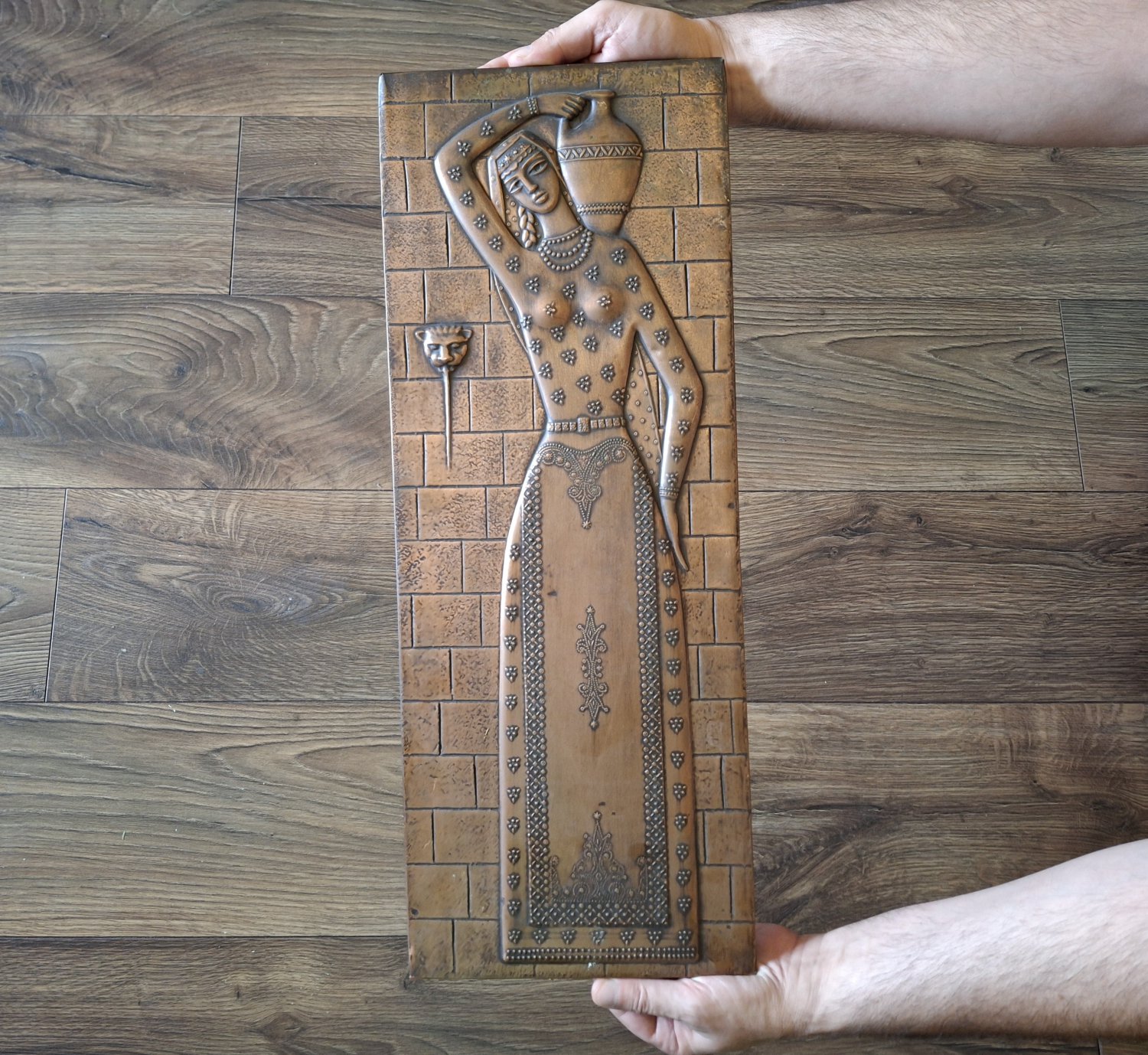 Vintage Embossed Copper Wall Decoration of an Ancient Armenian woman carrying Water