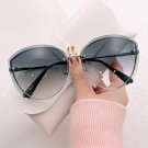 2022 trendy women's Oval Rimless Cat Eye Silver Grey Sunglasses Lady Metal Cay Eye Women Sunglasses.