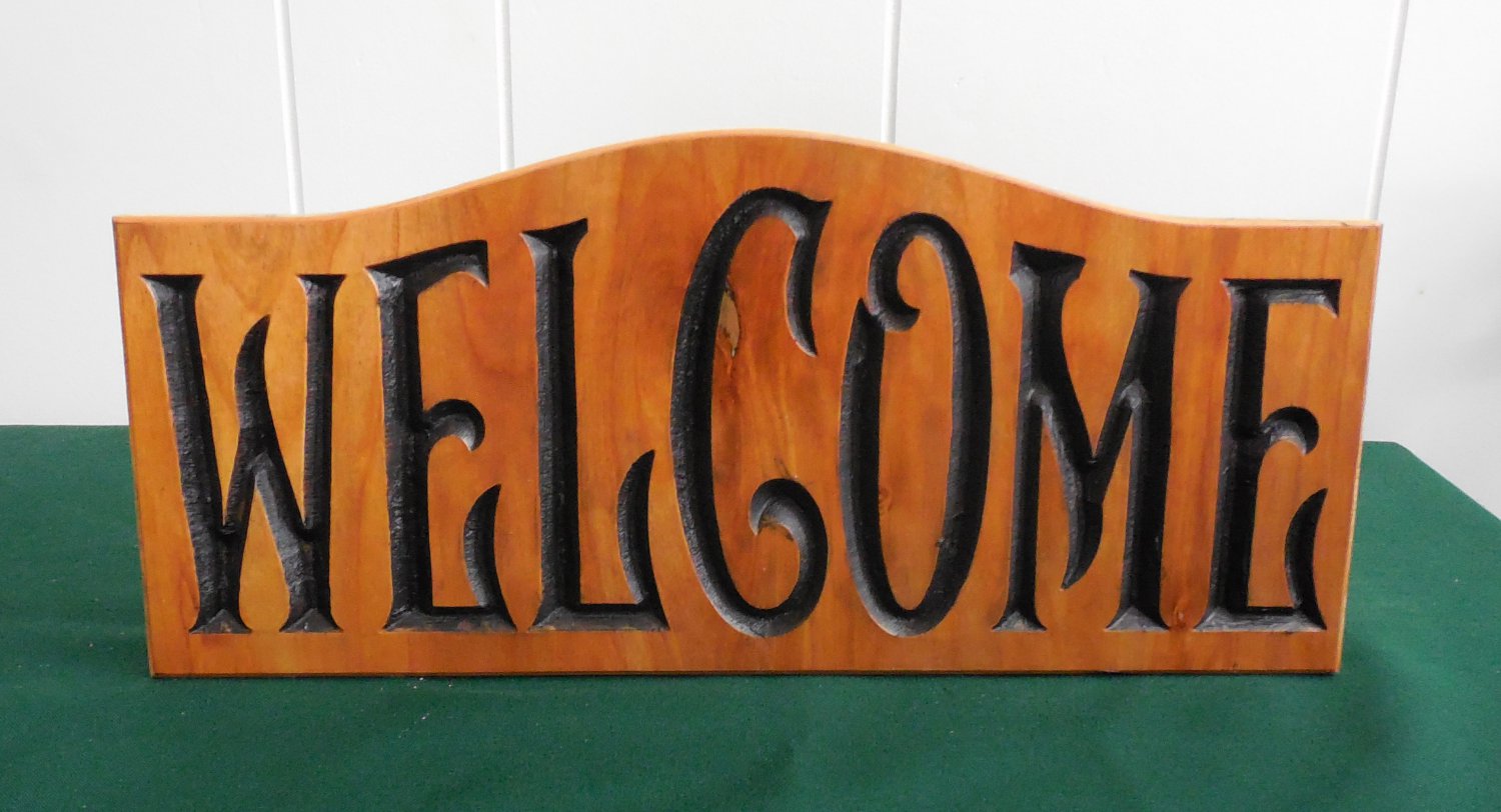 Carved Welcome sign