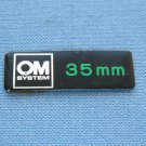 Vintage Olympus OM System 35mm Original Nameplate From a Lens Case
