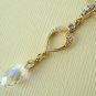 AB clear Swarovski Faceted Briolette with Gold Spade Connector Necklace